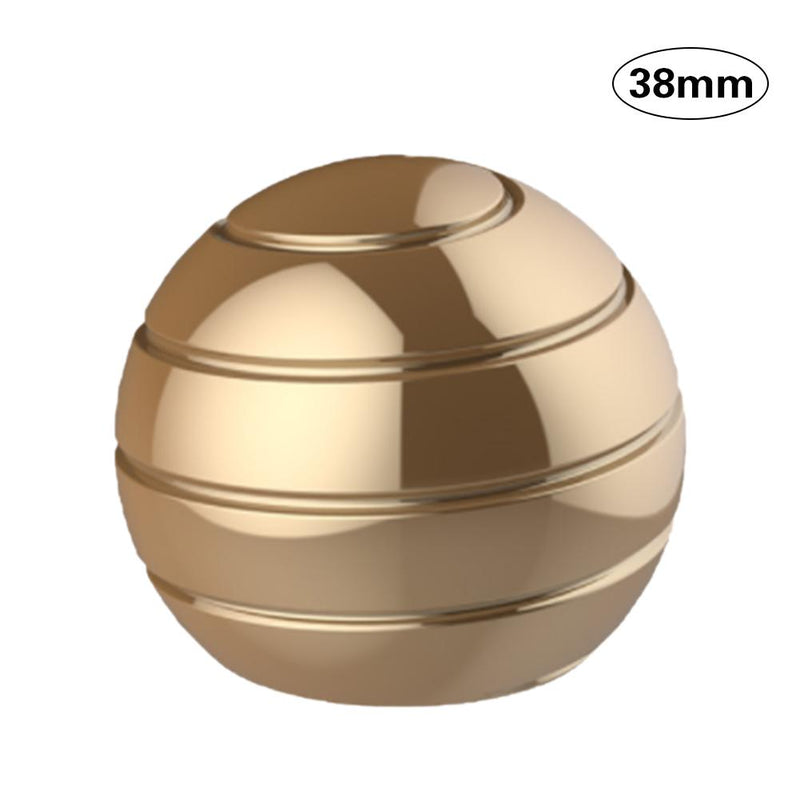Gyroscope sphérique rotatif en métal de 38 mm et de couleur doré.