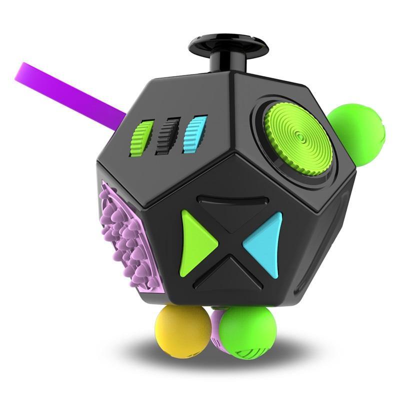Cube Anti-Stress noir avec quelques boutons vert, bleu, jaune et violet  