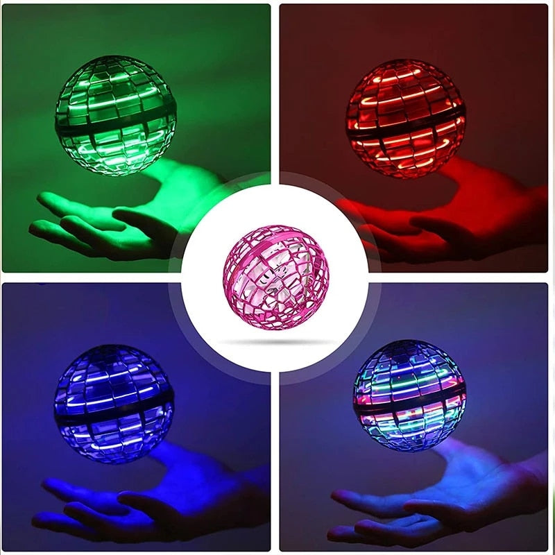 Image de 4 balles volante dont 1 de couleur verte, 1 de couleur rouge, 1 de couleur rose et 2 de couleurs bleue . Les balles volantes sont en lévitation au-dessus d'une main.
